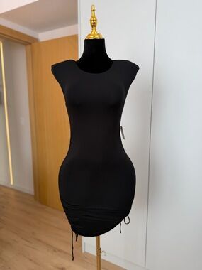 Express Black Ruched Mini Bodycon Dress with Structured Shoulders | Minimal Muse